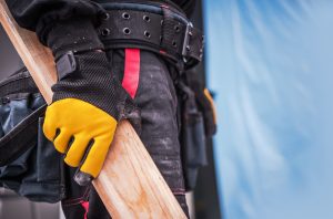 Contractor Worker With Plank